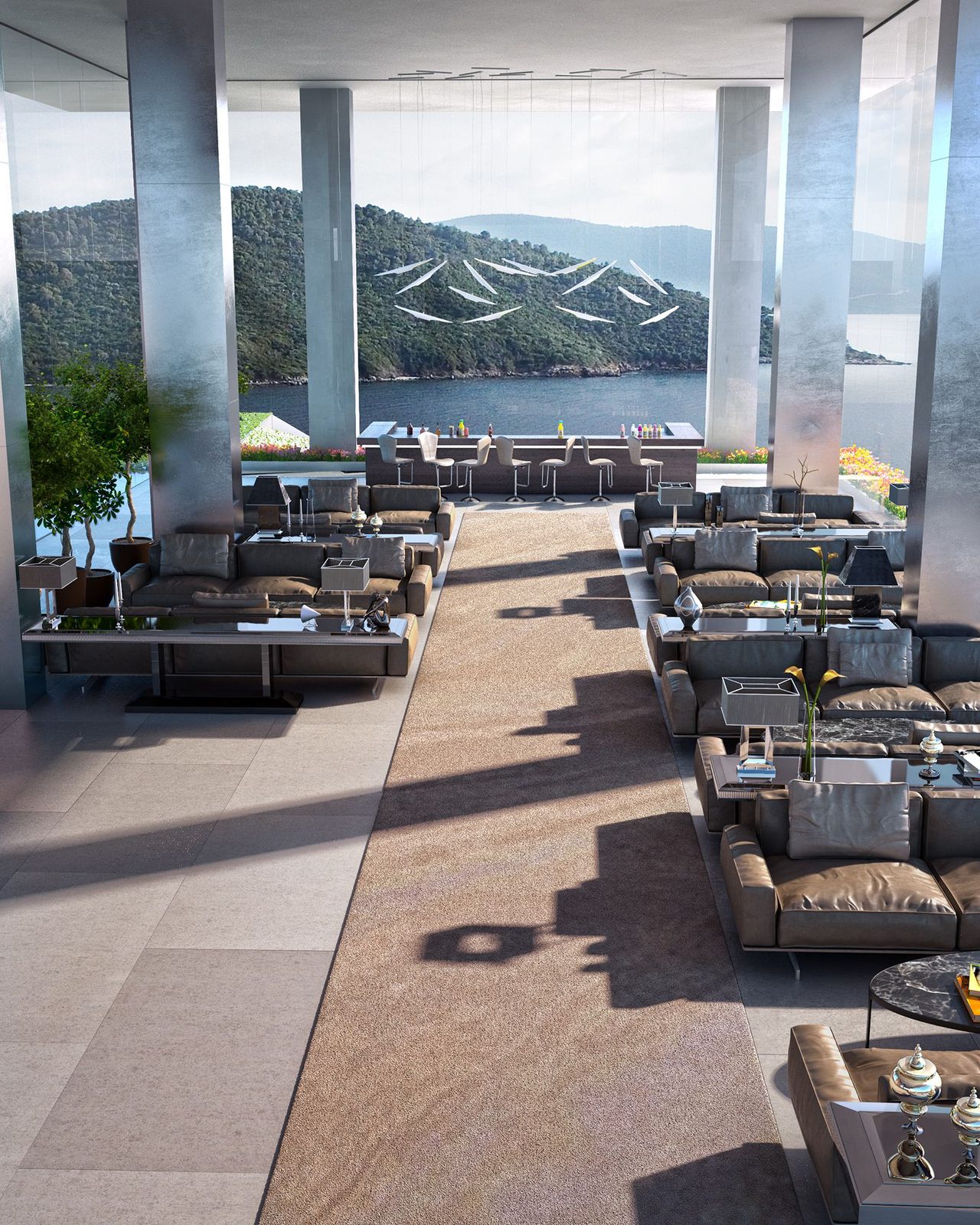 Elegant modern lounge with panoramic sea view in Bodrum, Turkey, featuring plush seating and stylish decor.