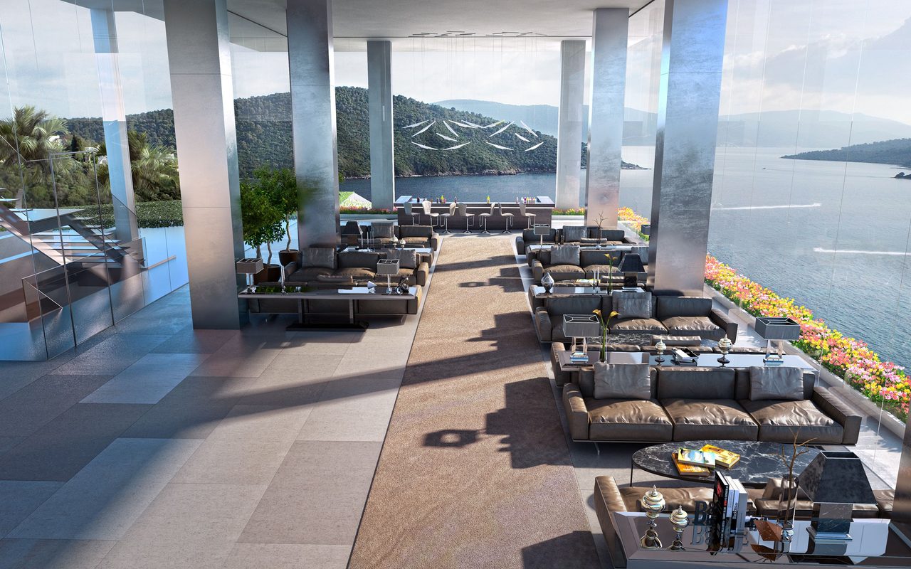 Elegant modern lounge with panoramic sea view in Bodrum, Turkey, featuring plush seating and stylish decor.