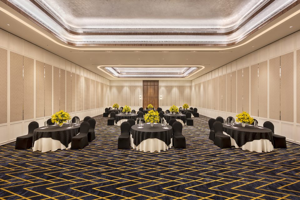 Banquet hall arranged with round tables