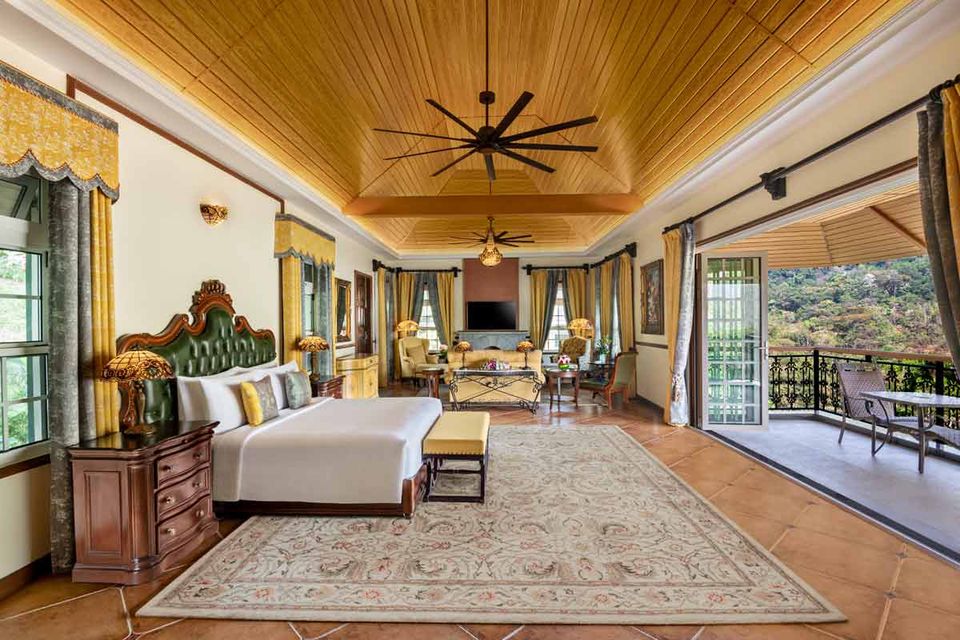 Suite living room beneath a timber ceiling