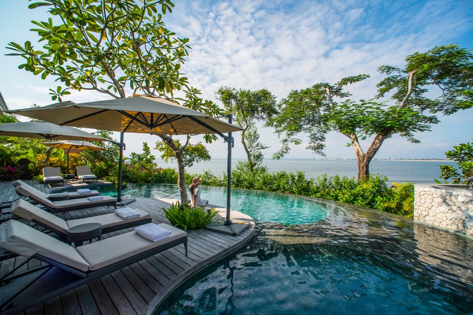 Pool and loungers overlooking Jimbaran Bay