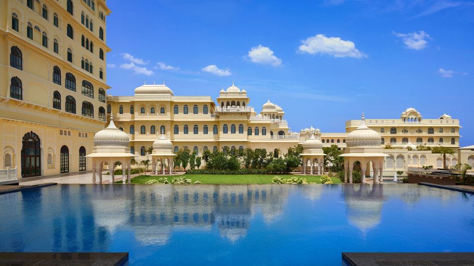 Outdoor pool reflecting domed palace pavilions
