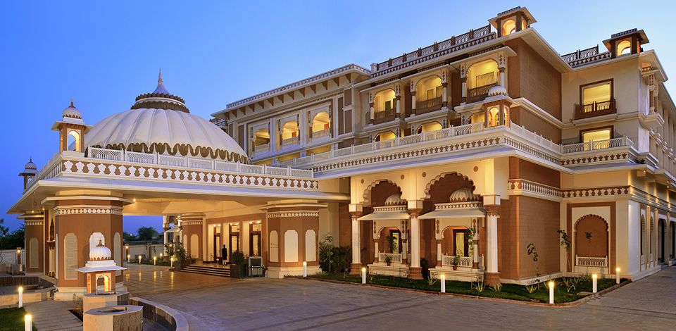 Palace entrance illuminated at dusk