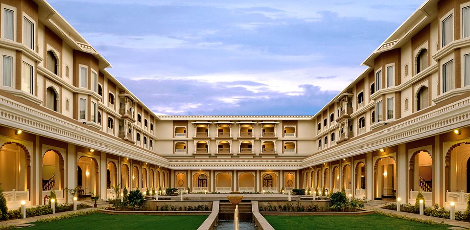 Formal courtyard framed by palace arcades