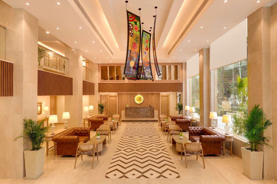 Lobby seating under a high ceiling
