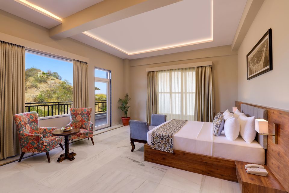 Guest room with a corner sitting area