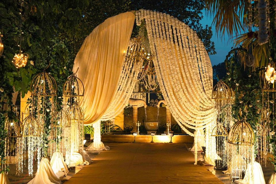 Illuminated ceremonial canopy in a garden