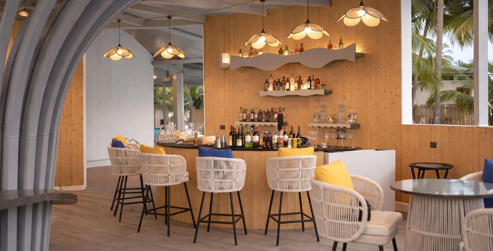 Curved restaurant interior with pendant lighting