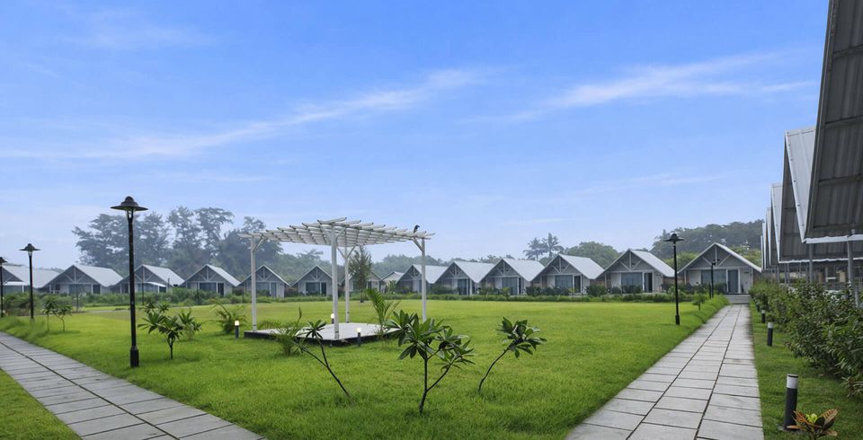 Cottages surrounding a broad landscaped lawn