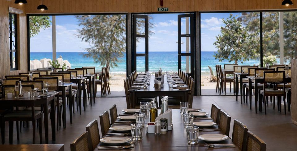 Restaurant tables overlooking the beach