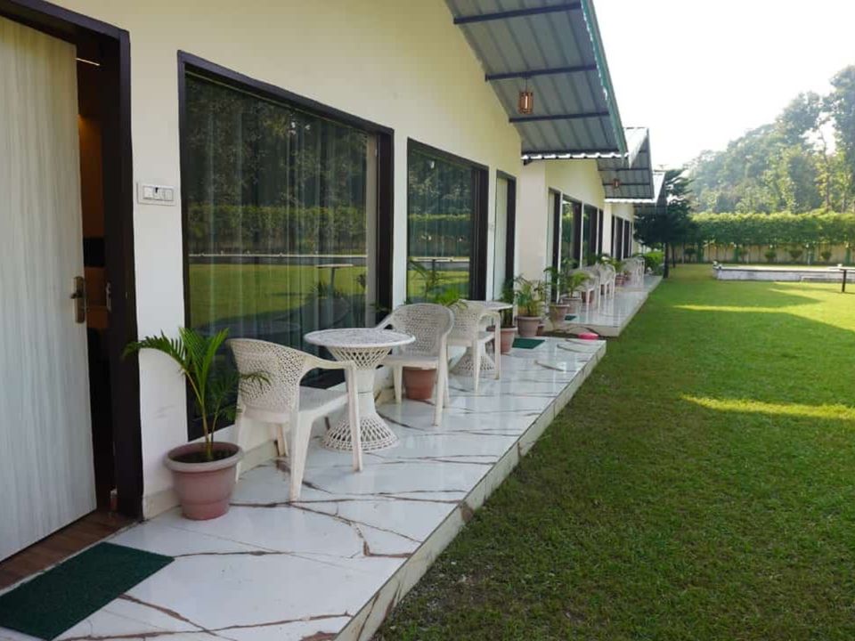 Cottage terraces beside a green lawn