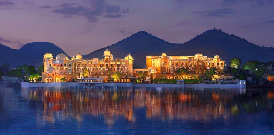 Palace hotel illuminated beside Lake Pichola
