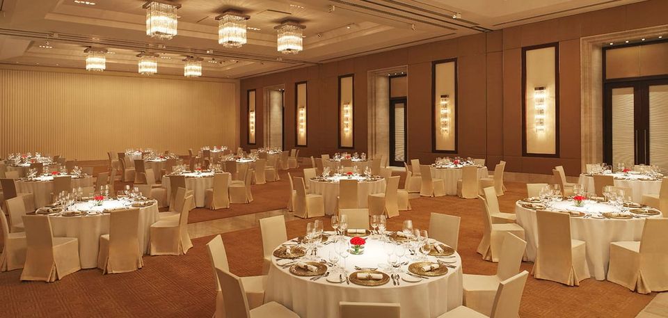 Banquet hall arranged with round tables