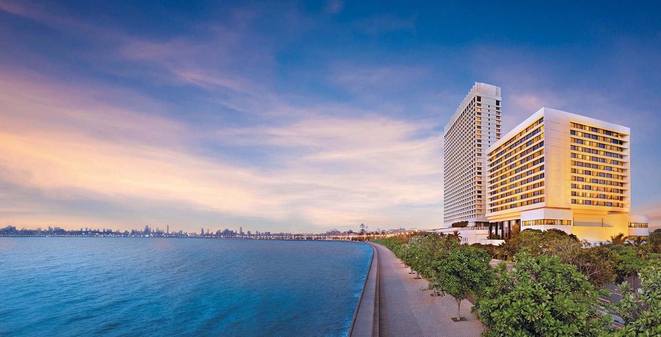 Seafront hotel beside Marine Drive at sunset