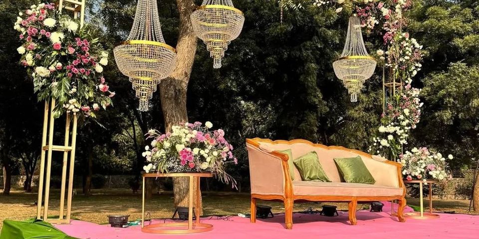 Floral backdrop and garden lounge seating