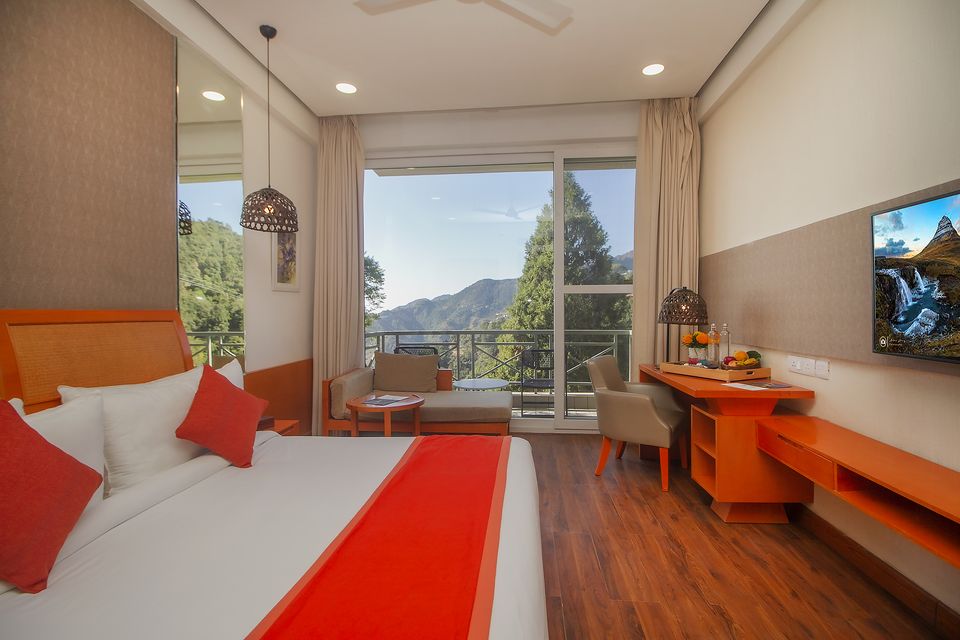 Guest bedroom with mountain views